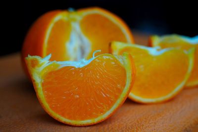 Close-up of orange slice on table