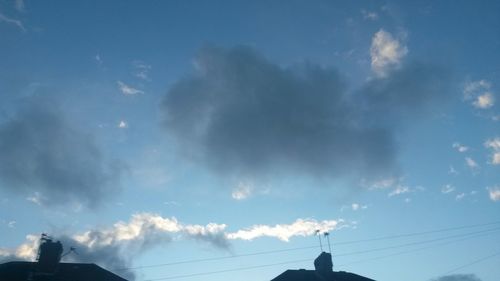 Low angle view of built structure against blue sky