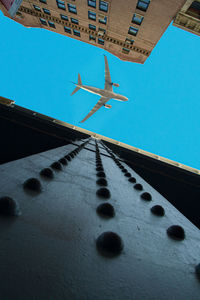 Low angle view of building against blue sky