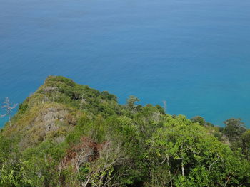 High angle view of sea against clear blue sky