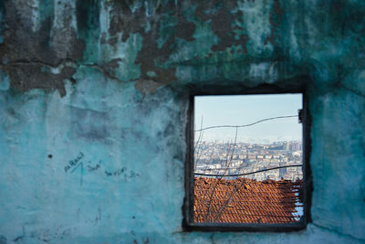 Buildings seen through window