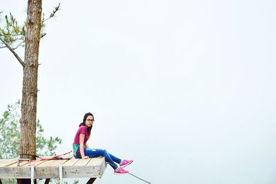 Low angle view of person against sky