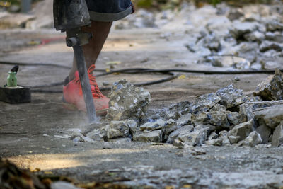 Man working at shore