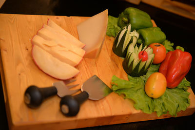 High angle view of vegetables on cutting board
