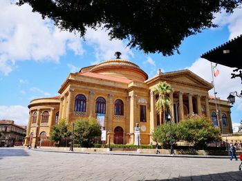 Facade of historic building against sky