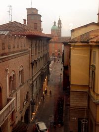 Road along buildings in city