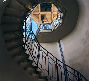 Low angle view of spiral staircase in building