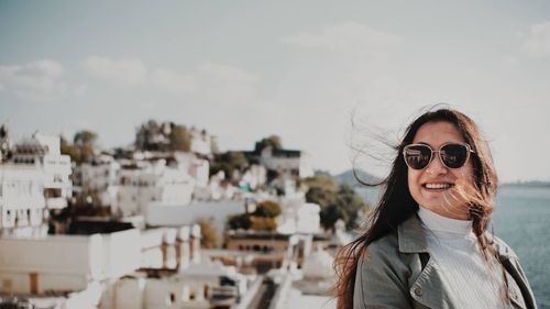 Portrait of smiling young woman outdoors