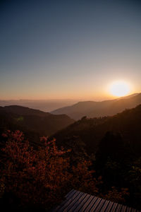 Scenic view of mountains against sky during sunset