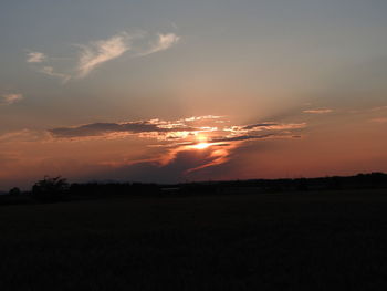 Scenic view of landscape at sunset