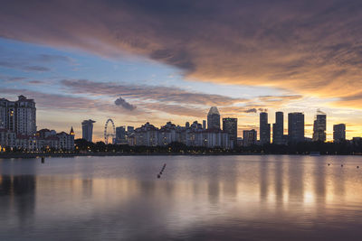 Scenic view of cityscape against sky during sunset