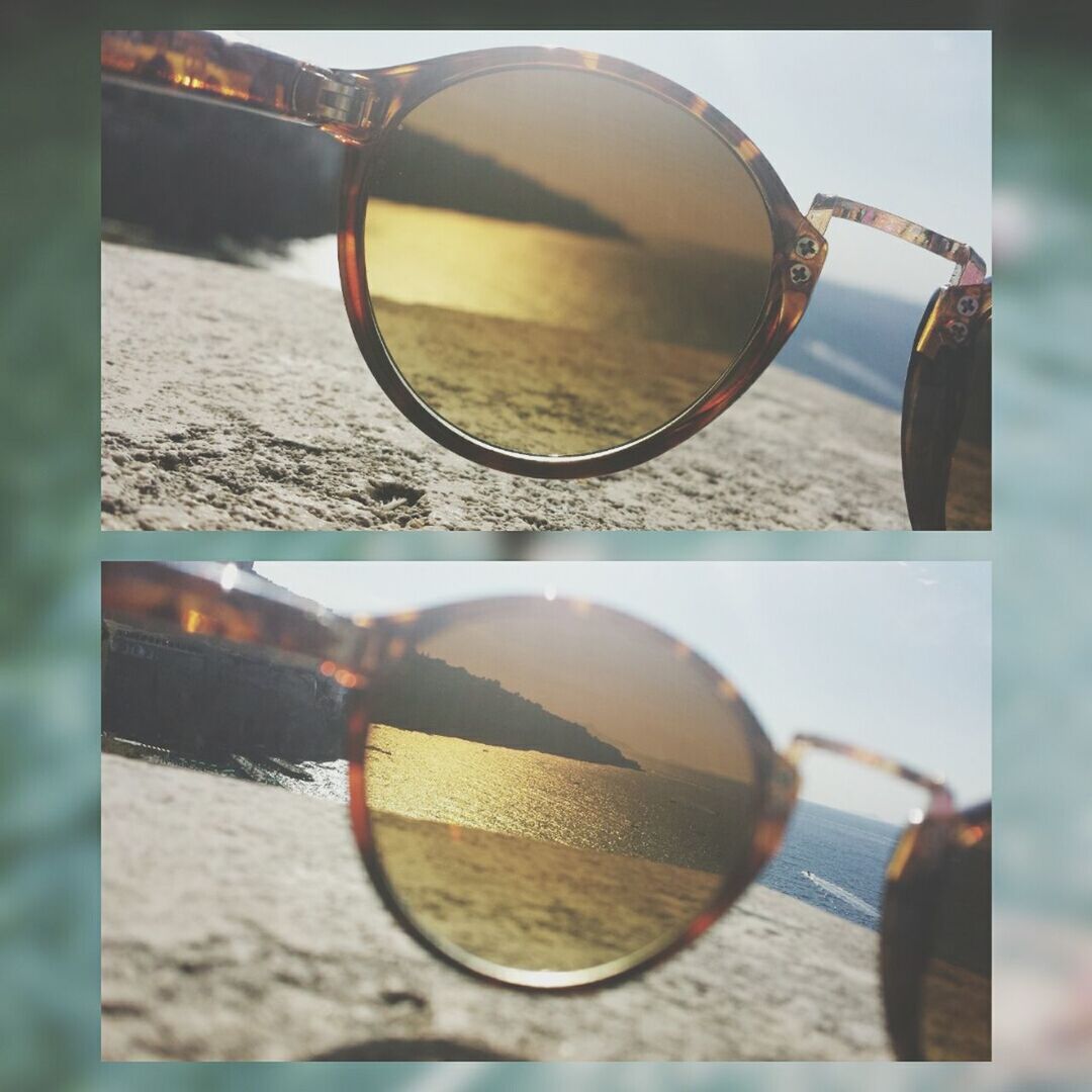 close-up, circle, focus on foreground, metal, no people, reflection, selective focus, sunlight, day, sky, outdoors, wheel, transportation, sunglasses, side-view mirror, sport, part of, auto post production filter, geometric shape, still life