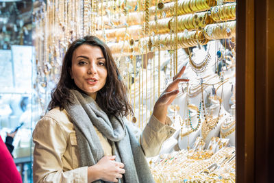 Portrait of smiling woman in store