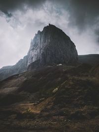 Rock formations on landscape against sky