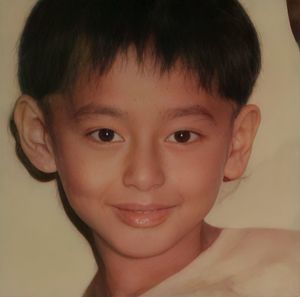 Close-up portrait of smiling boy