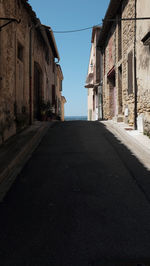 Surface level of street amidst buildings in city