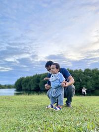 Full length of boy playing soccer