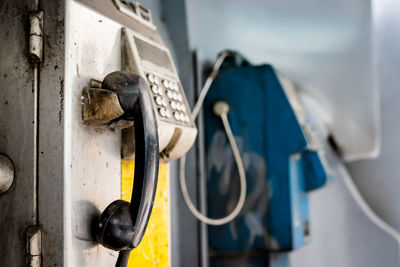 Close-up of telephone booth outdoors