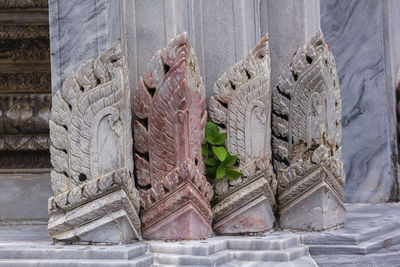 Close-up of statue against wall