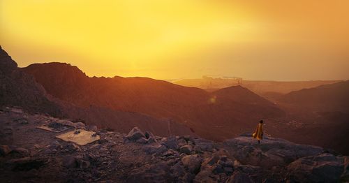 Scenic view of mountains against sky during sunset