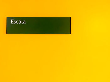 Close-up of yellow text