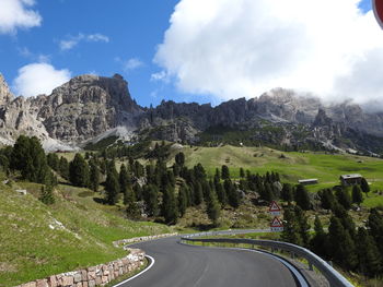 Panoramic view of road amidst mountains against sky