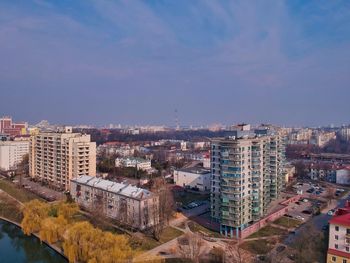 High angle view of buildings in city against sky