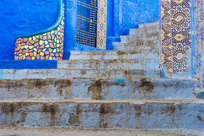 Low angle view of blue wall in old building