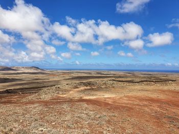 Scenic view of desert against sky