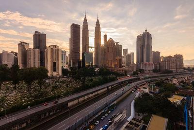 View of modern buildings in city against sky