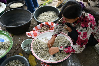 High angle view of man preparing food