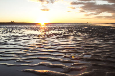 View of calm sea at sunset