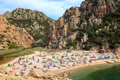 High angle view of people on beach against sky