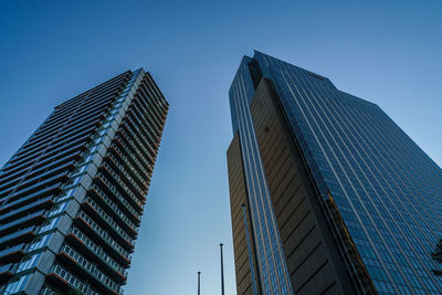 Low angle view of modern buildings against sky