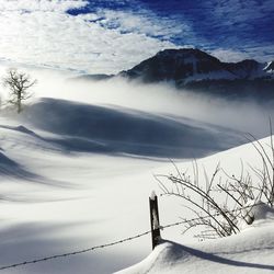 Scenic view of mountains against sky