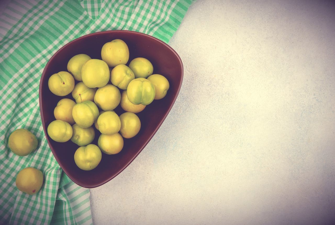 food, food and drink, yellow, healthy eating, wellbeing, green, freshness, indoors, produce, macro photography, fruit, plant, no people, high angle view, still life, bowl, large group of objects, sweetness