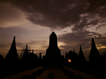 Silhouette temple against sky during sunset