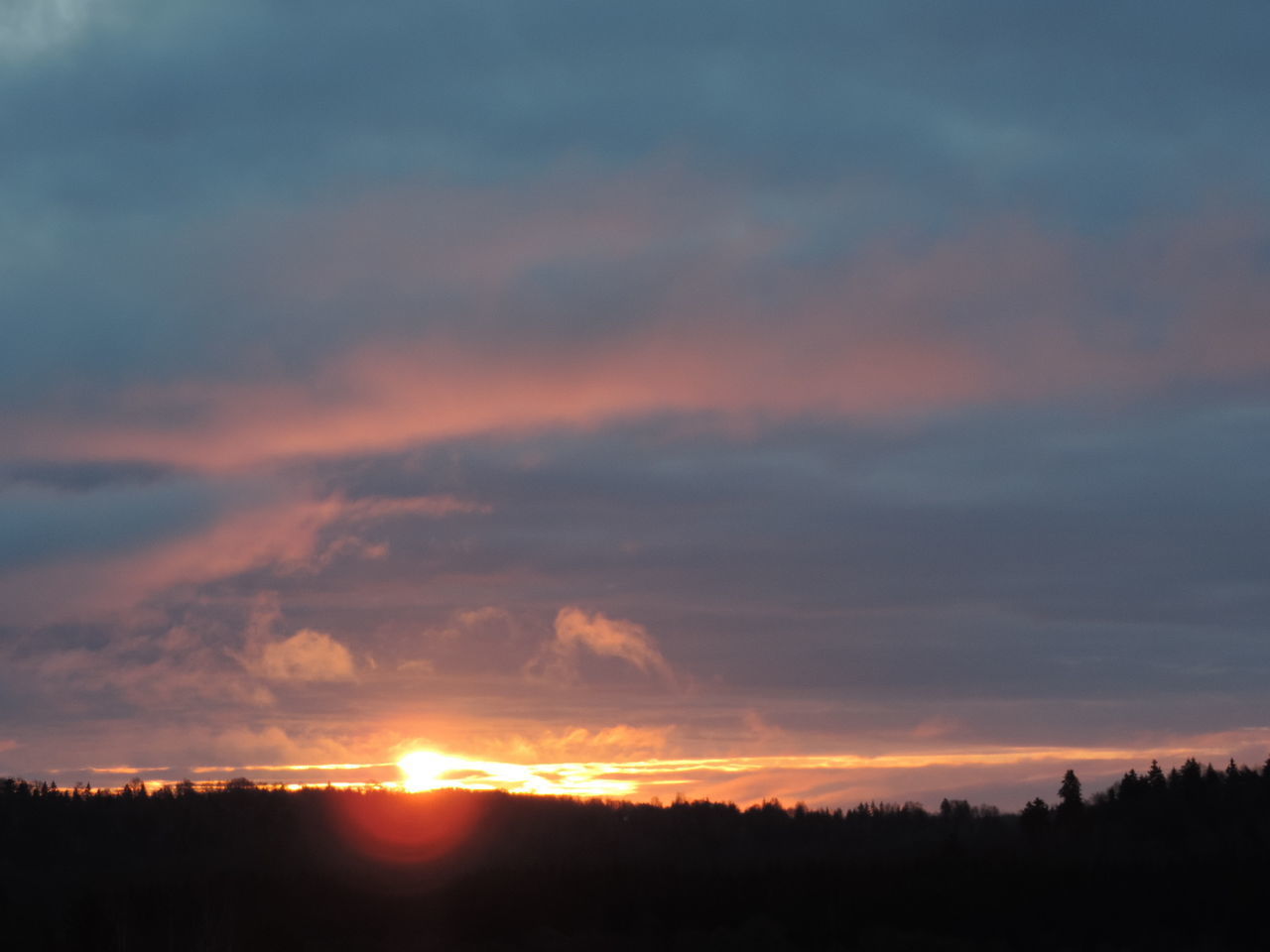 SCENIC VIEW OF SILHOUETTE LANDSCAPE AGAINST ORANGE SKY