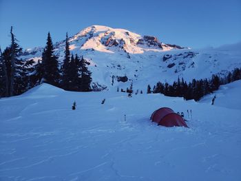 Scenic view of snow covered mountain against sky