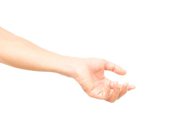 Close-up of hands over white background