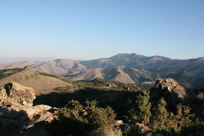 Scenic view of mountains against clear sky