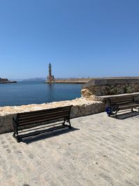 Scenic view of sea against clear blue sky