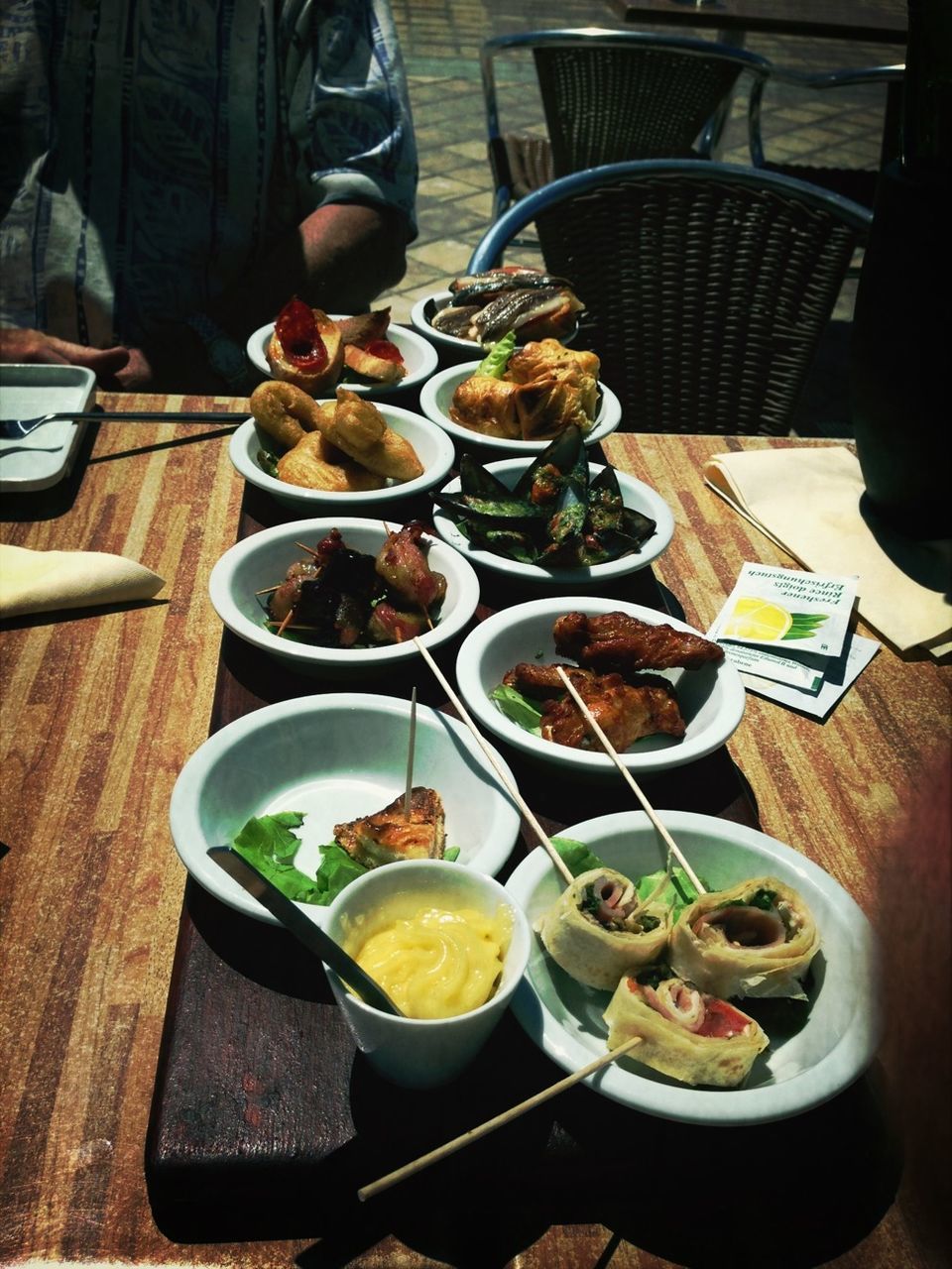 food and drink, food, table, freshness, indoors, healthy eating, plate, ready-to-eat, meal, vegetable, still life, bowl, high angle view, salad, serving size, served, restaurant, meat, variation, fork