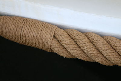 High angle view of rope against wall