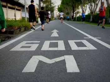 People walking on road in city