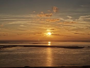 Scenic view of sea at sunset