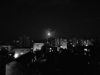 Illuminated cityscape at night