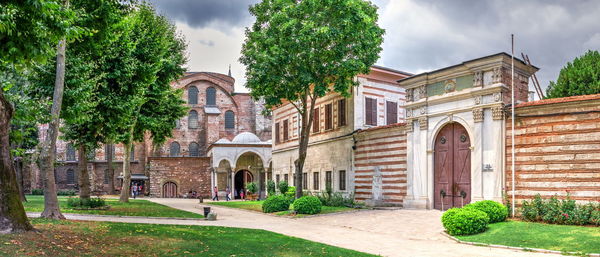 Facade of historic building against sky