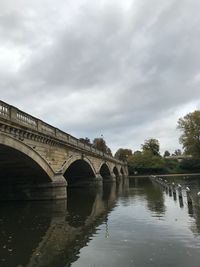 Arch bridge over river