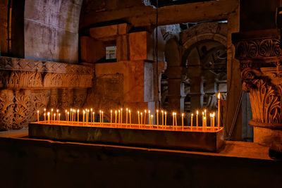 Illuminated candles in church of the holy sepulchre